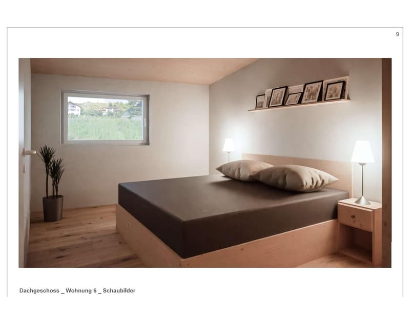 Minimalist room with a double bed, nightstand, lamps, wall with pictures, window with a view outside.