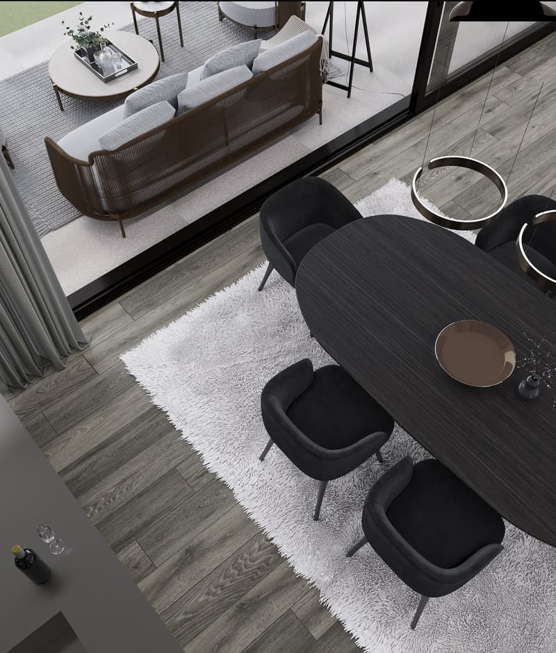 Spacious living room with large windows, gray sofa, black armchairs, wooden coffee table, and a plush white rug on the hardwood floor.