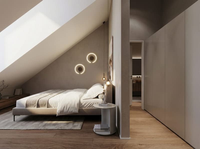 Bedroom with bed, nightstand, and lamps. Sloped ceiling. Wooden floor and wall. Walk-in closet.