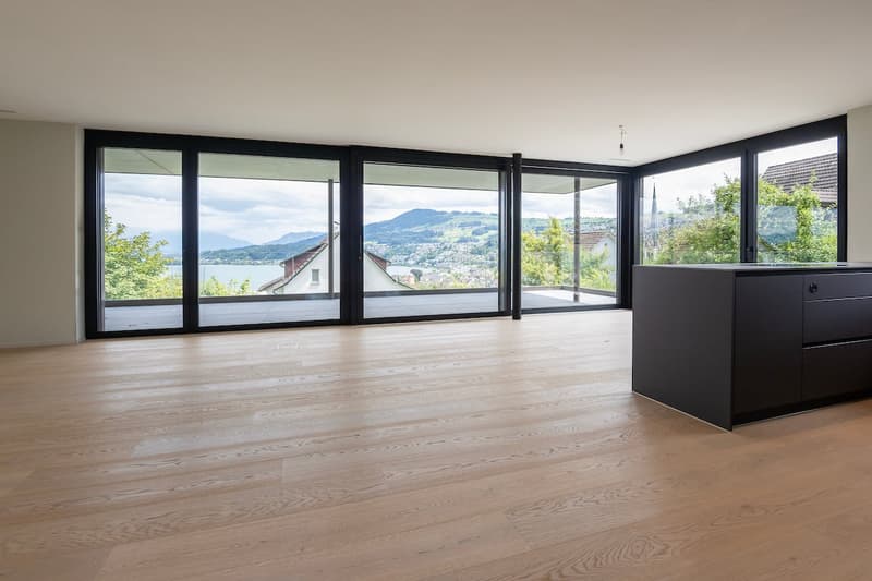 floor to ceiling windows, wooden floor, large balcony, lake view