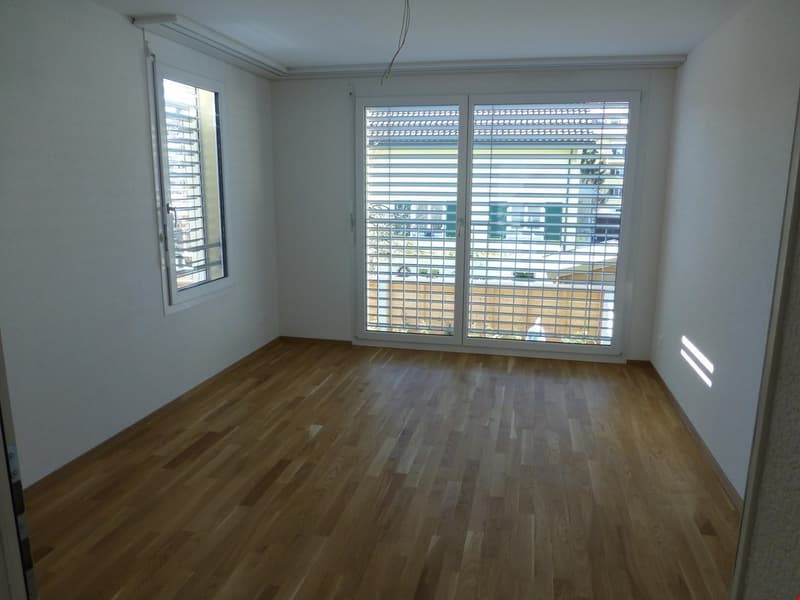 Zimmer 1 mit Balkon Musterwohnung