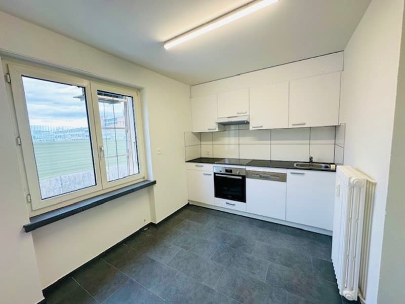 Appartamento luminoso, ristrutturato, 3,5 locali con balcone, disponibile immediatamente a Münchenstein (15)