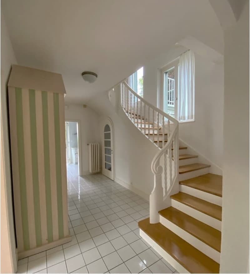 white tiled floor, white walls, spiral staircase, white railing, white ceiling, white curtains, white radiator