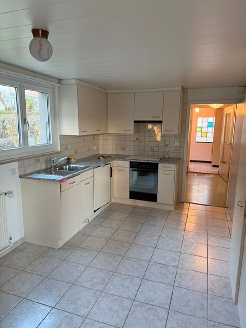 modern kitchen, white cabinets, grey tiles, open space, window