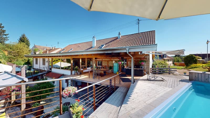 House with wooden deck, raised ground floor, swimming pool, balcony