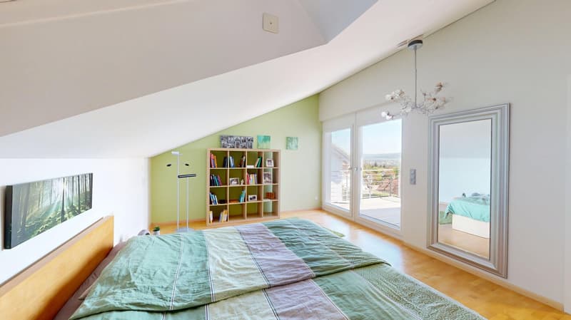 bedroom with bed, bookshelf, lamp, picture frame, balcony, sliding glass doors, chandelier