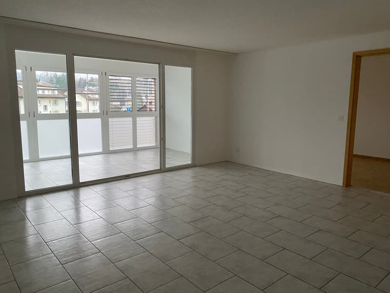 Wohnzimmer mit Wintergarten/Essecke