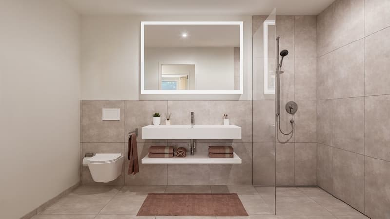 Modern bathroom with white vanity, large mirror, tiled walls and floor, shower, and towel storage