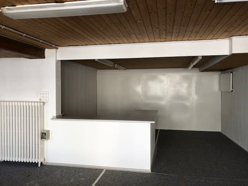 empty room, counter, radiator, wood ceiling, lamps