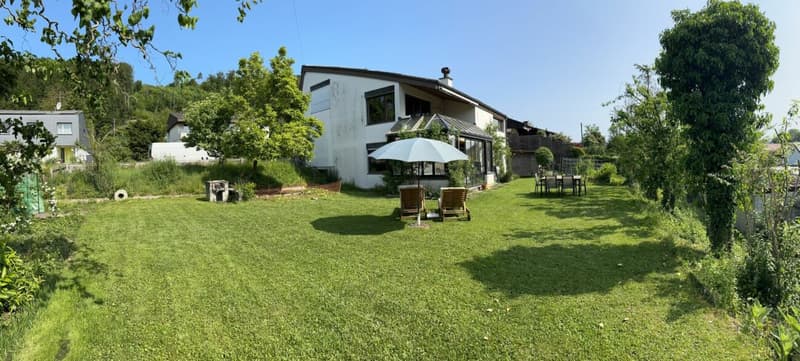 Detached 5.5-room single-family house with winter garden, garage, and sunny garden (2)