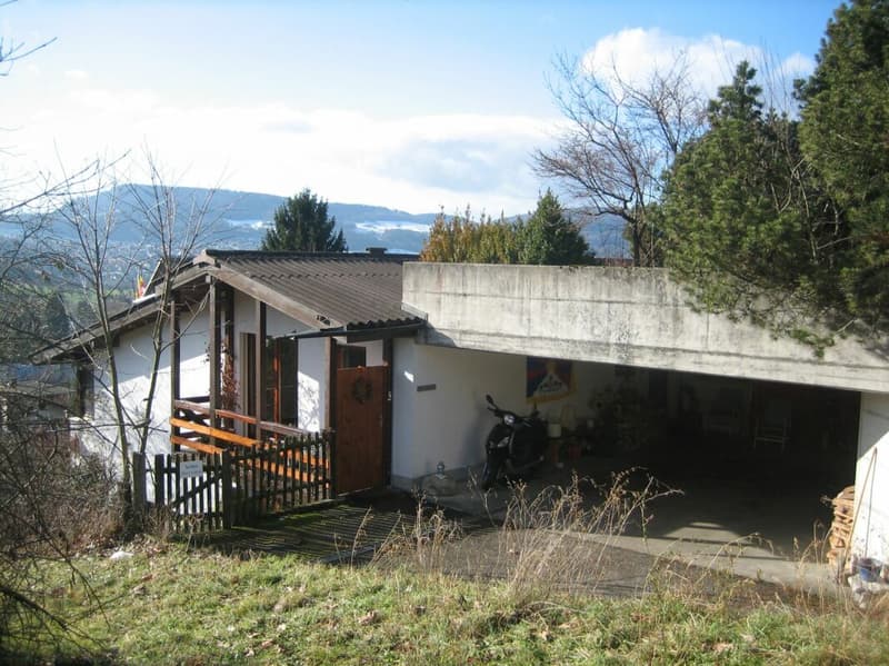 Spacious single-family home with 2 apartments, parking, panoramic views, and garden in top location (15)