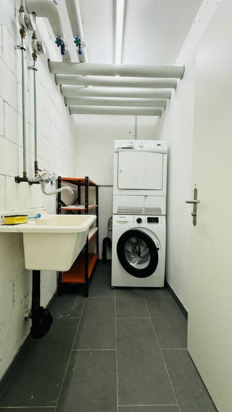 4.5-room maisonette with balcony, 2 wet cells, 2 underground parking spaces, laundry tower, and cellar (26)