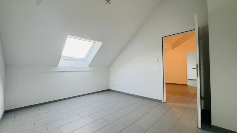 4.5-room maisonette with balcony, 2 wet cells, 2 underground parking spaces, laundry tower, and cellar (25)