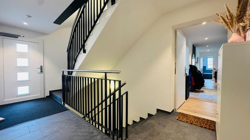 Maisonnette spacieuse de 5,5 pièces avec jardin, véranda, 2 salles de bains, atelier et place de parking (12)