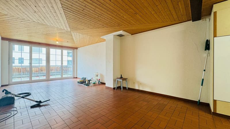 Appartement rénové de 5,5 pièces au 1er étage d'une maison de 2 familles bien entretenue avec balcon, parking et usage de jardin (15)