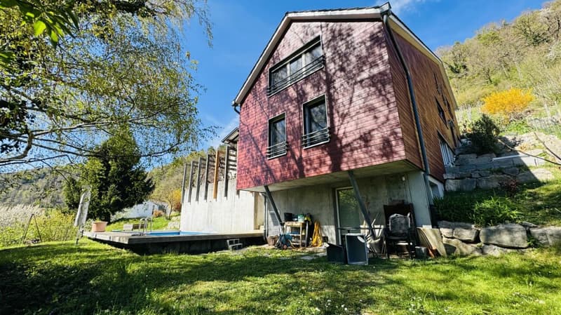 6.5-Zimmer-Architektenhaus mit Pool, Garagenbox, 3 Parkplätzen und Weitsicht (1)