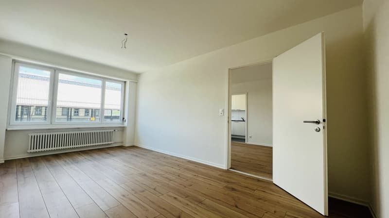 Neuwertige 2,5-Zimmerwohnung mit Balkon und Keller direkt am Bahnhof (1053) (4)