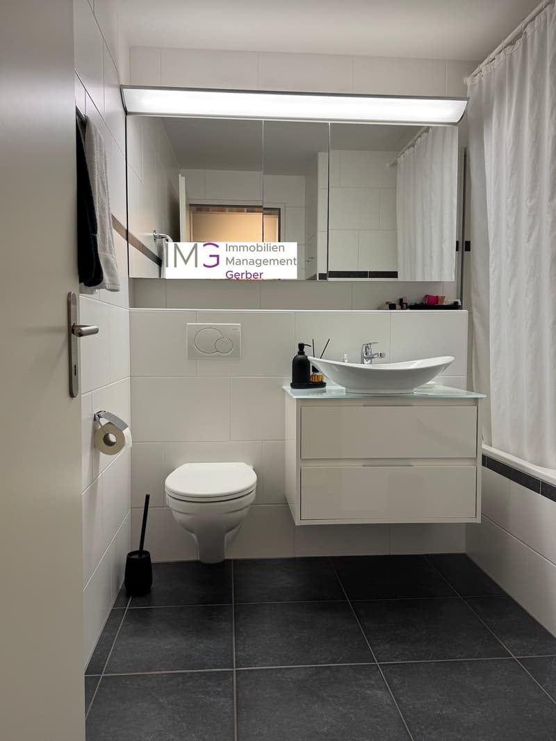 Mint-condition apartment with private laundry room (13)