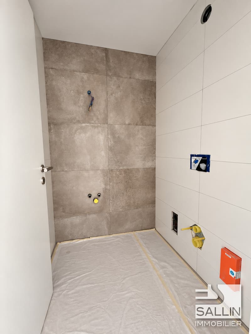 Appartement neuf de 3½ pièces, avec parking, au centre ville (7)