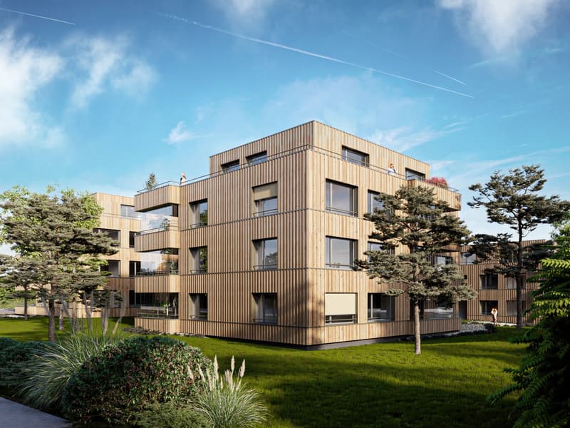 Modern apartment building with wooden facade, multiple balconies, and a green lawn