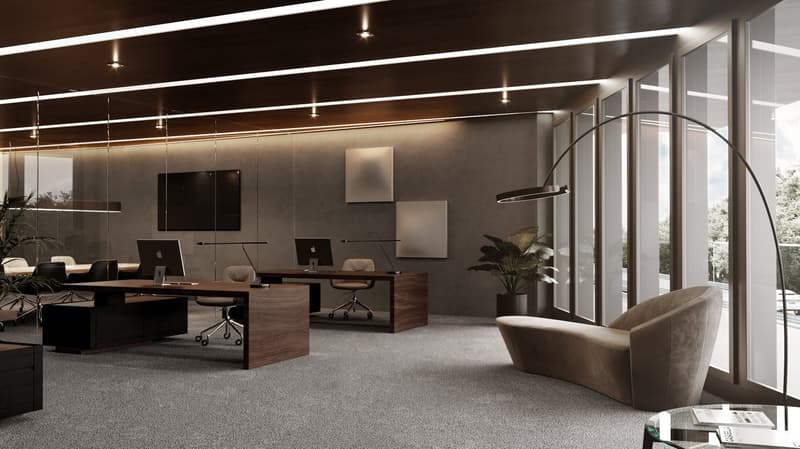 modern office interior with large windows, wooden desks, swivel chairs, beige couches, and a floor lamp