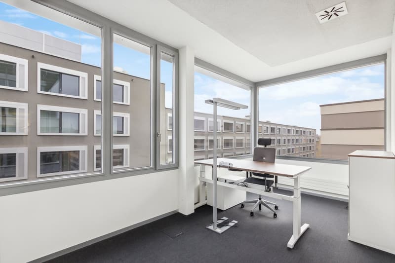 empty office room, large windows, desk, office chair, white walls, black floor