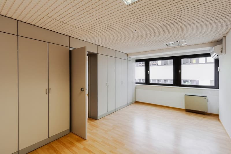 empty room, wooden floor, large windows, open door, large closets