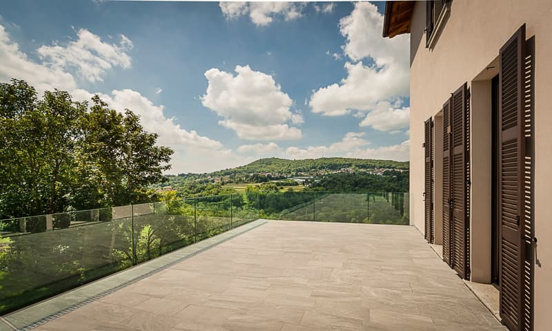 terrace, glass railing, tiled floor, view of mountains and hills