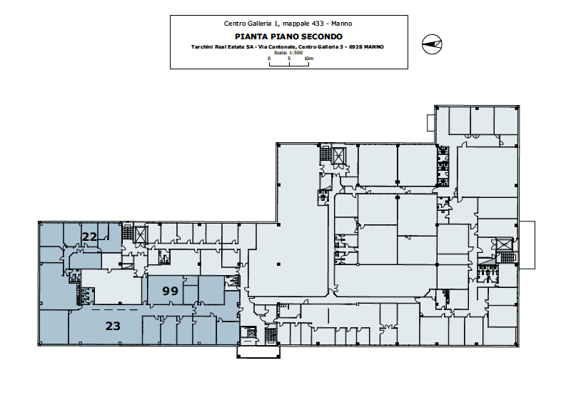 The image shows a floor plan of a building called 'Centro Galleria 1, mappale 433 - Manno'. The plan includes various rooms and spaces, such as room 22, room 23, and room 99. The layout suggests this is a commercial or office building, but the specific us