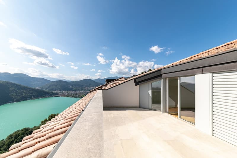 Terrace with lake view, tiled roof, glass doors, white walls