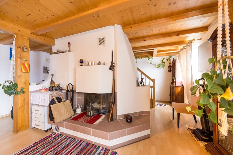 Haus West - Wohnzimmer mit Warmluftkamin