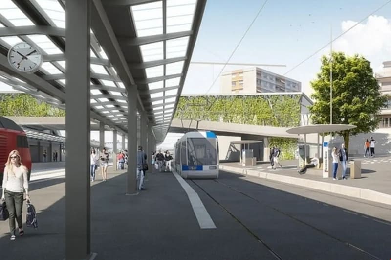 tram station with tram on track, waiting shed, trees, clock, people, red train