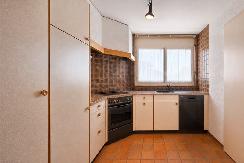 Ampio appartamento di 4 locali con grande potenziale in un quartiere ricercato (5)