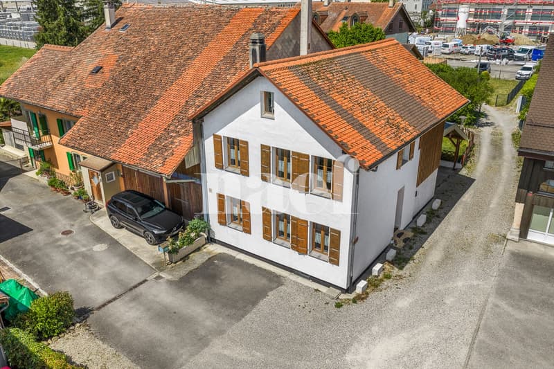 Maison villageoise jumelle de 4.5 pièces avec véranda et jardin à vendre à Granges-Marnand (1)