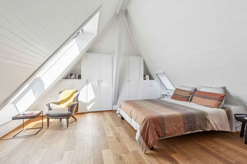 La chambre à coucher de la mezzanine