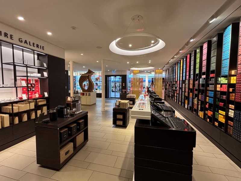 retail store interior with a display of colorful boxes and a modern design