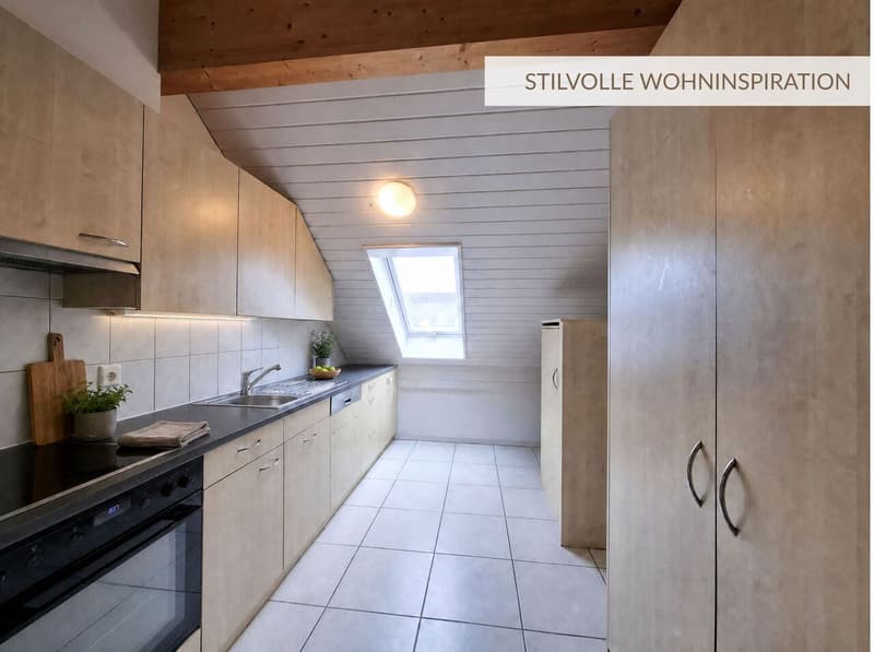 Dachwohnung mit Weitsicht und gemütlichem Charakter (4)