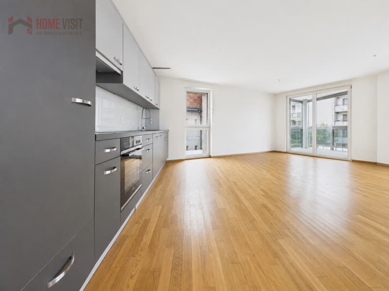 Wohnzimmer mit offene Küche