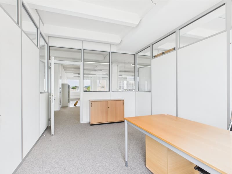 office room, empty, wooden desk, wooden cabinet, white walls, large windows, gray floor