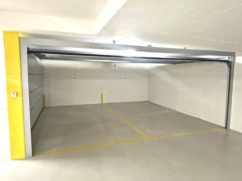 Parking space in underground garage & motorized double garage (2)