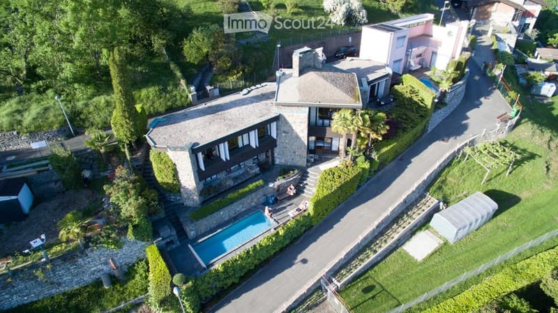 Elegante Villa Unifamiliare a Brè con Piscina e Vista (5)