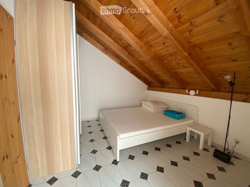 Furnished attic apartment with sunny balcony and exposed beams (3)