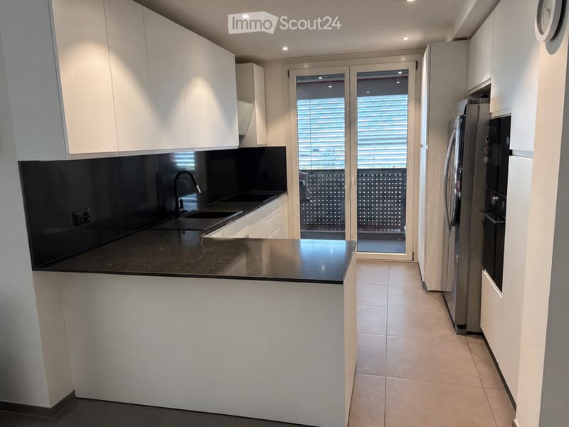Appartement moderne de 4,5 pièces à Giubiasco avec jardin (2)