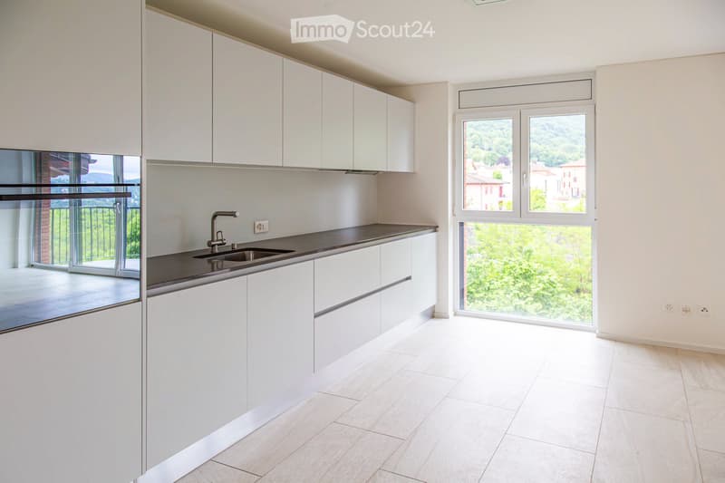 Appartement en attique 3.5 pièces avec local hobby de 40 m² à Cadro (2)