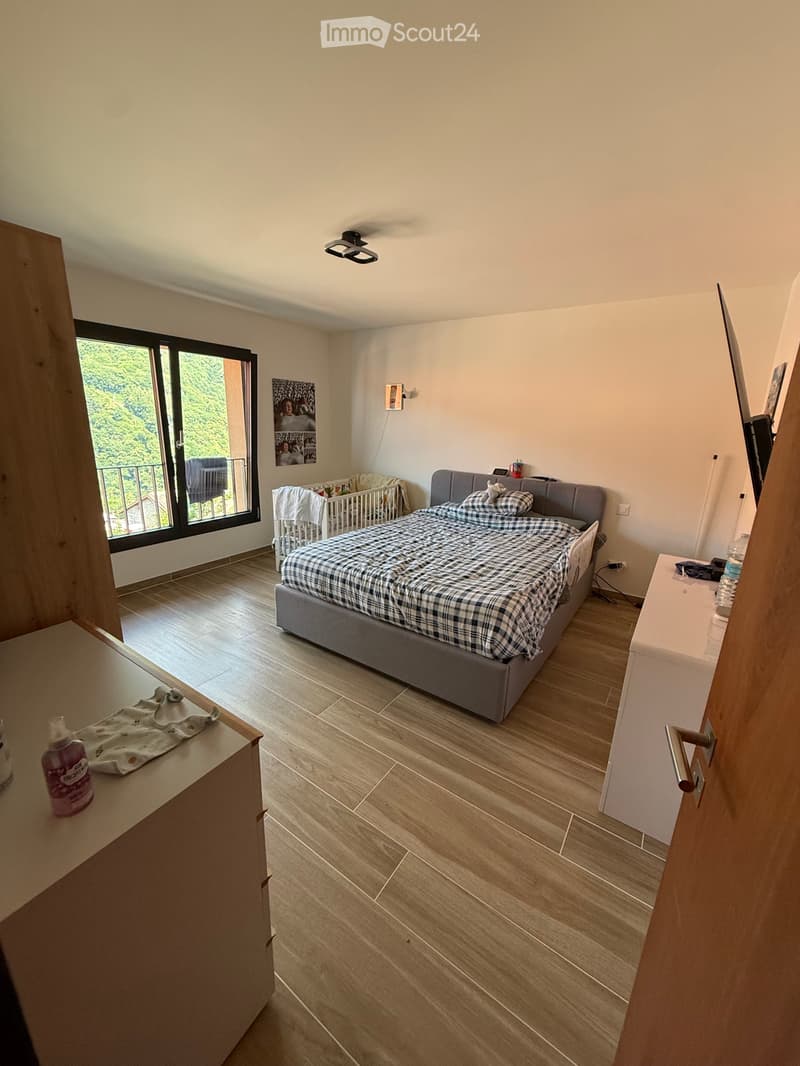 Casa unifamiliare con giardino (3)