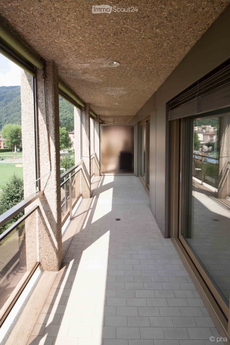 Affittasi luminoso 2.5 a Melide con terrazzo vista lago (5)