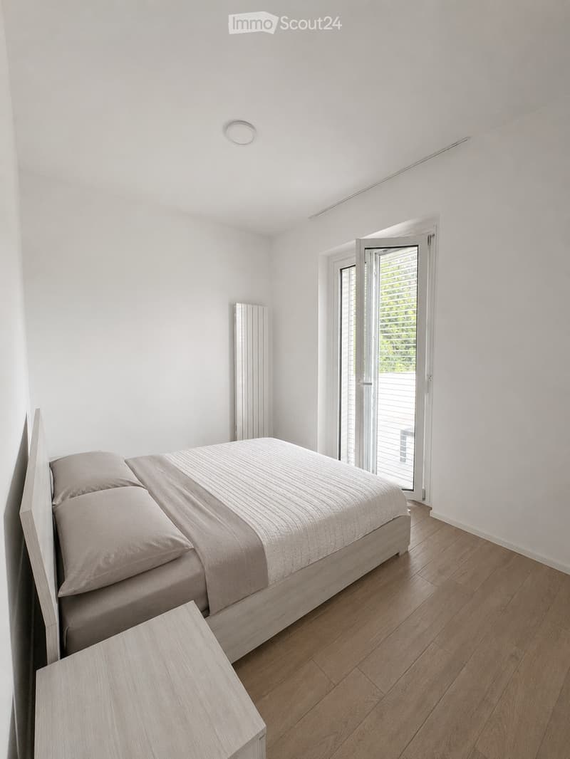 CUREGLIA, Moderno appartamento 2.5 locali, ampio balcone (1)