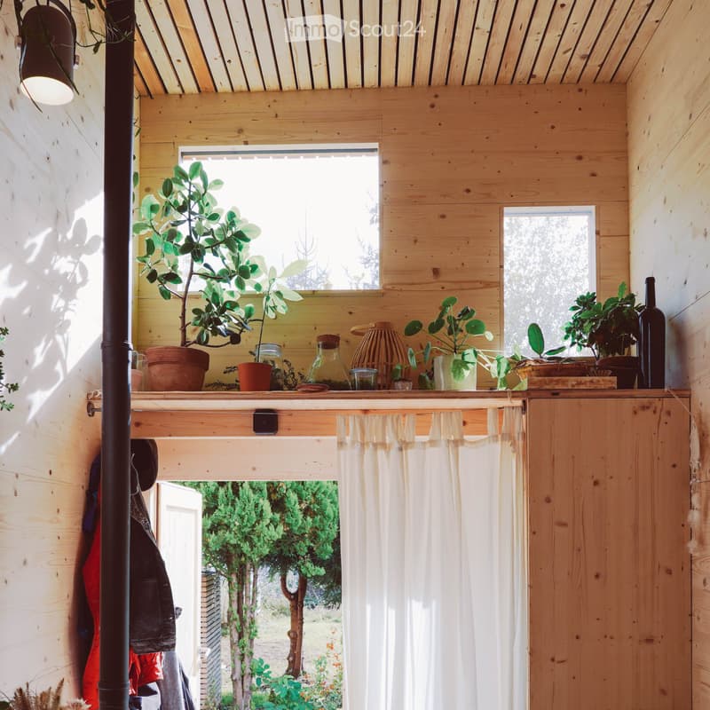 Tiny house made from a two-story shipping container (2)