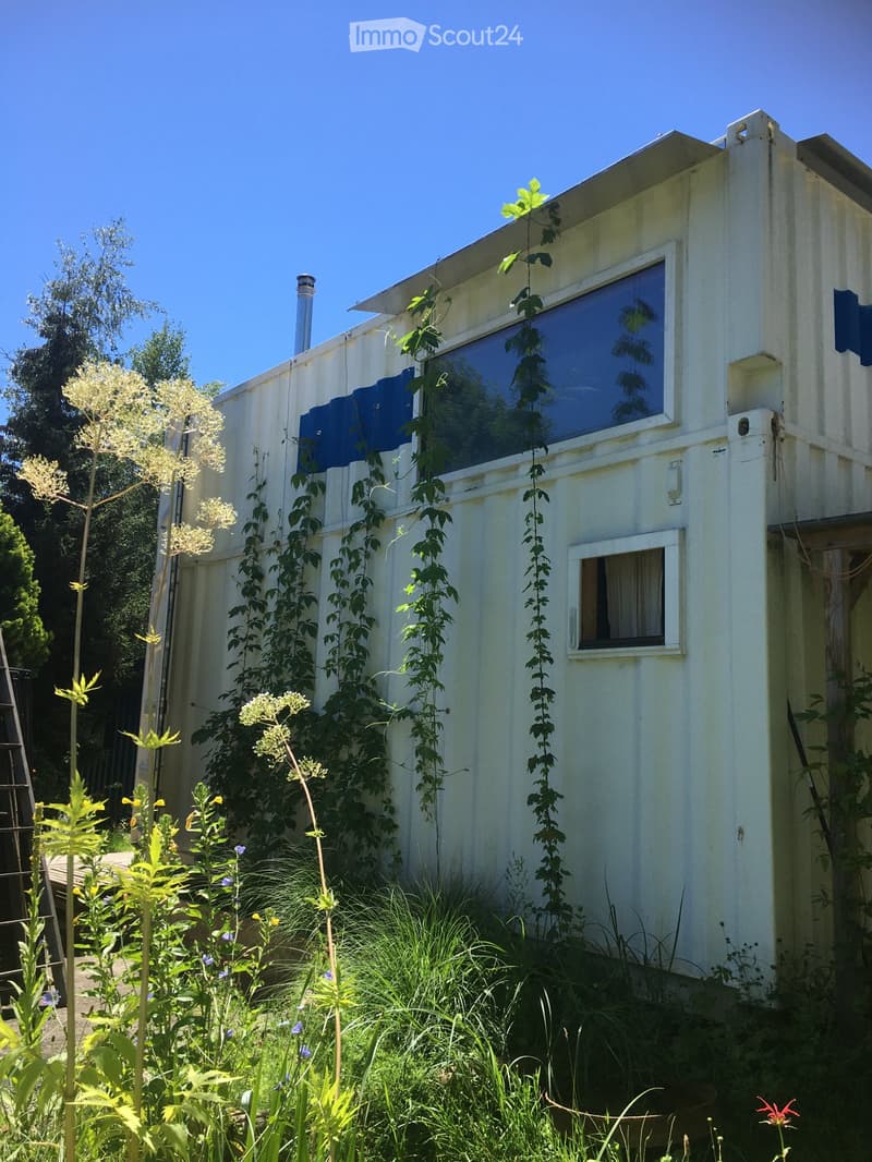 Tiny house made from a two-story shipping container (5)