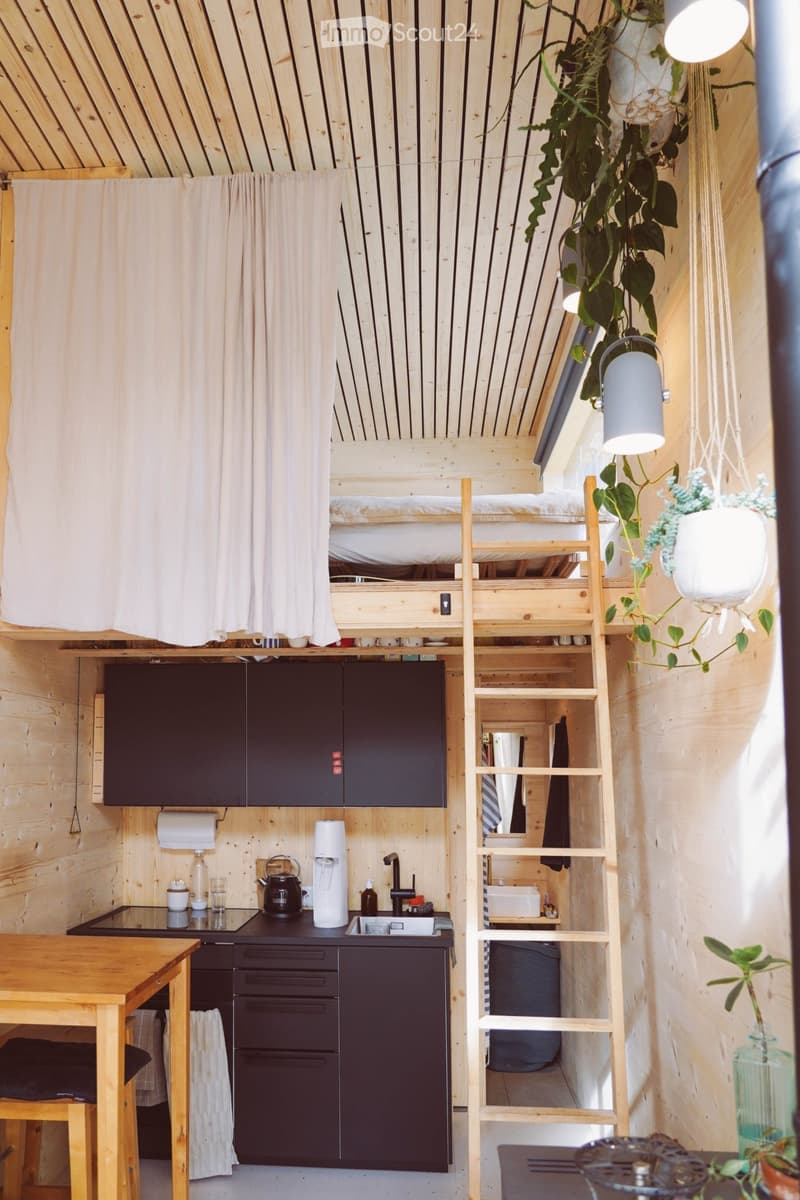 Tiny house made from a two-story shipping container (3)